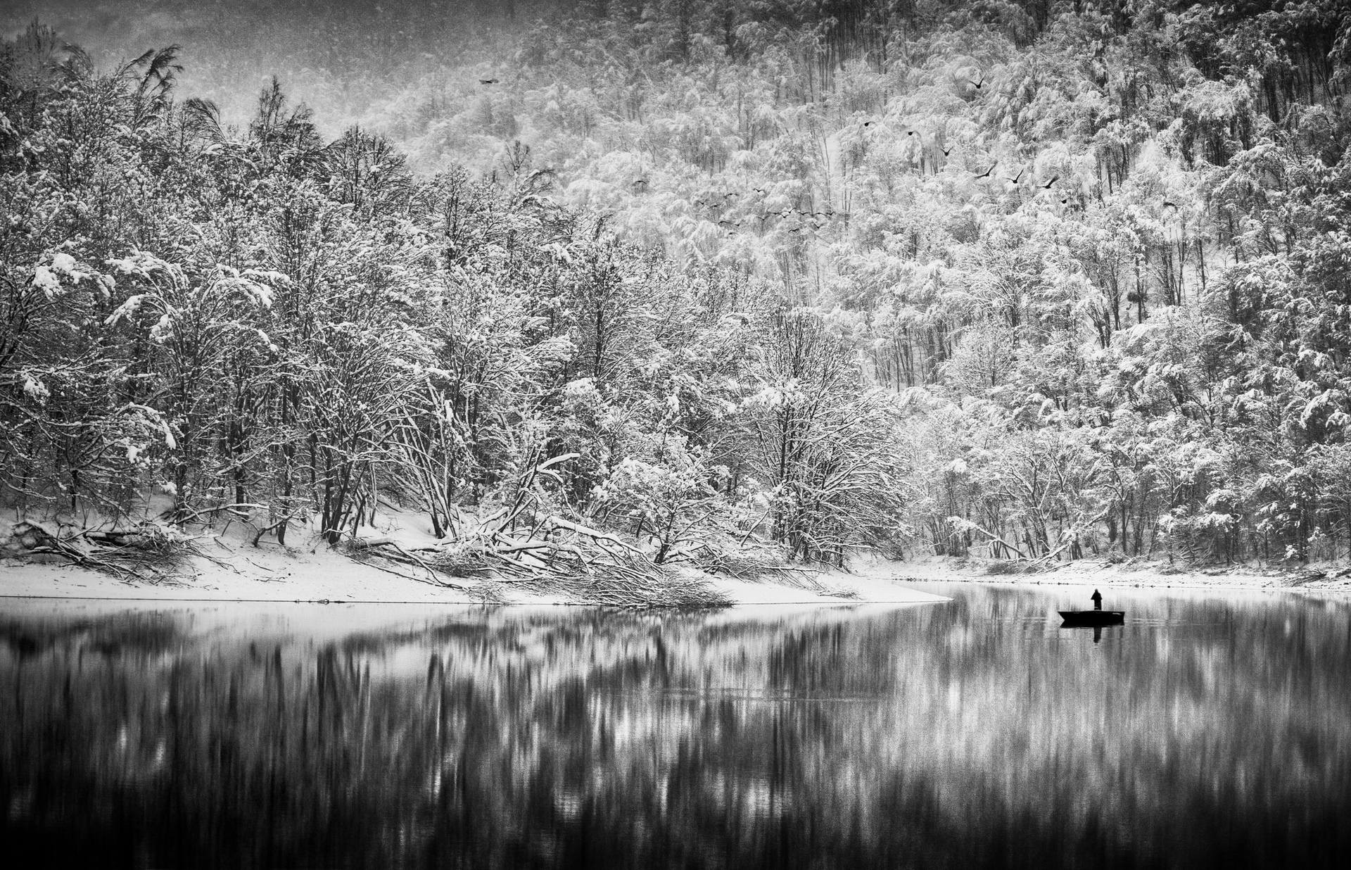 Рыбалка на озере после снегопада. Автор Петер Свобода