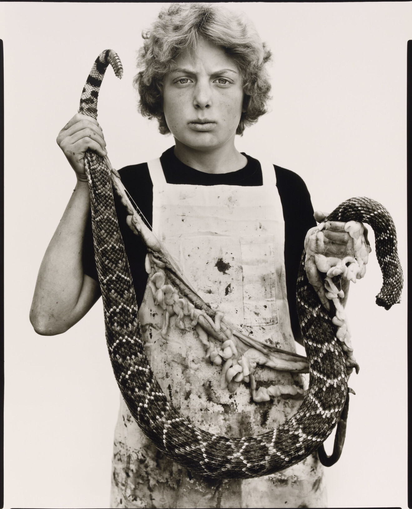 Бойд Фортин, тринадцатилетний Скиннер гремучей змеи, Свитуотер, Техас, 1979 г. Фотограф Ричард Аведон
