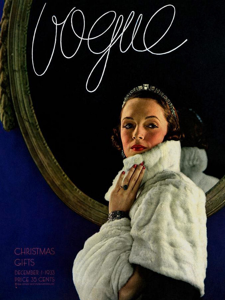 Обложка Vogue модели в плаще и муфте, 1933 г. Фотограф Эдвард Стайхен