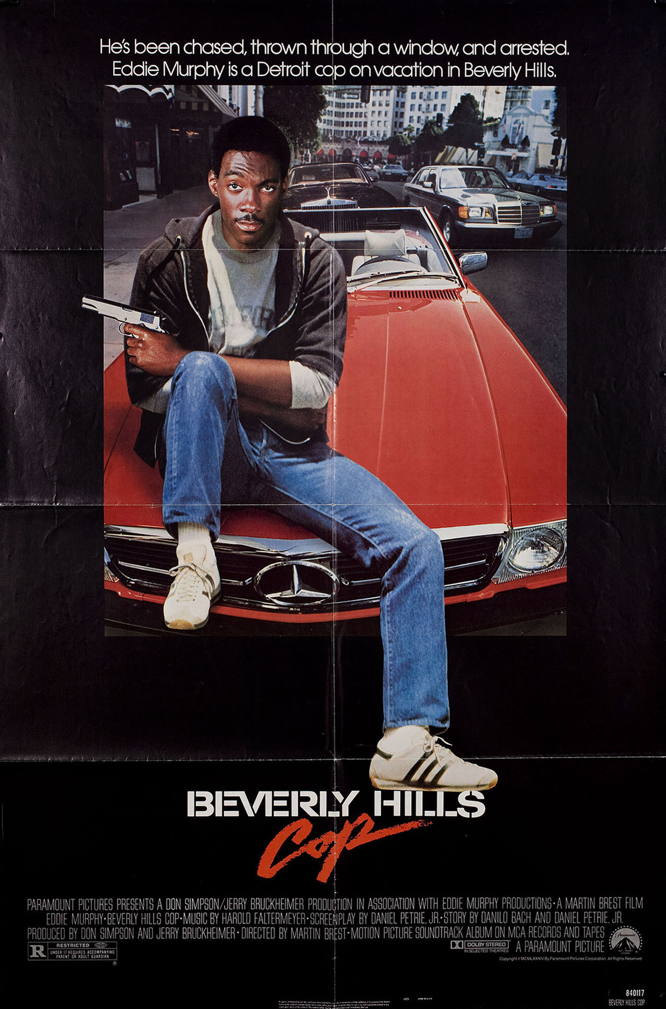 Полицейский из Беверли-Хиллз (Beverly Hills Cop, 1984), режиссёр Мартин Брест, американский постер к фильму, 1984 год