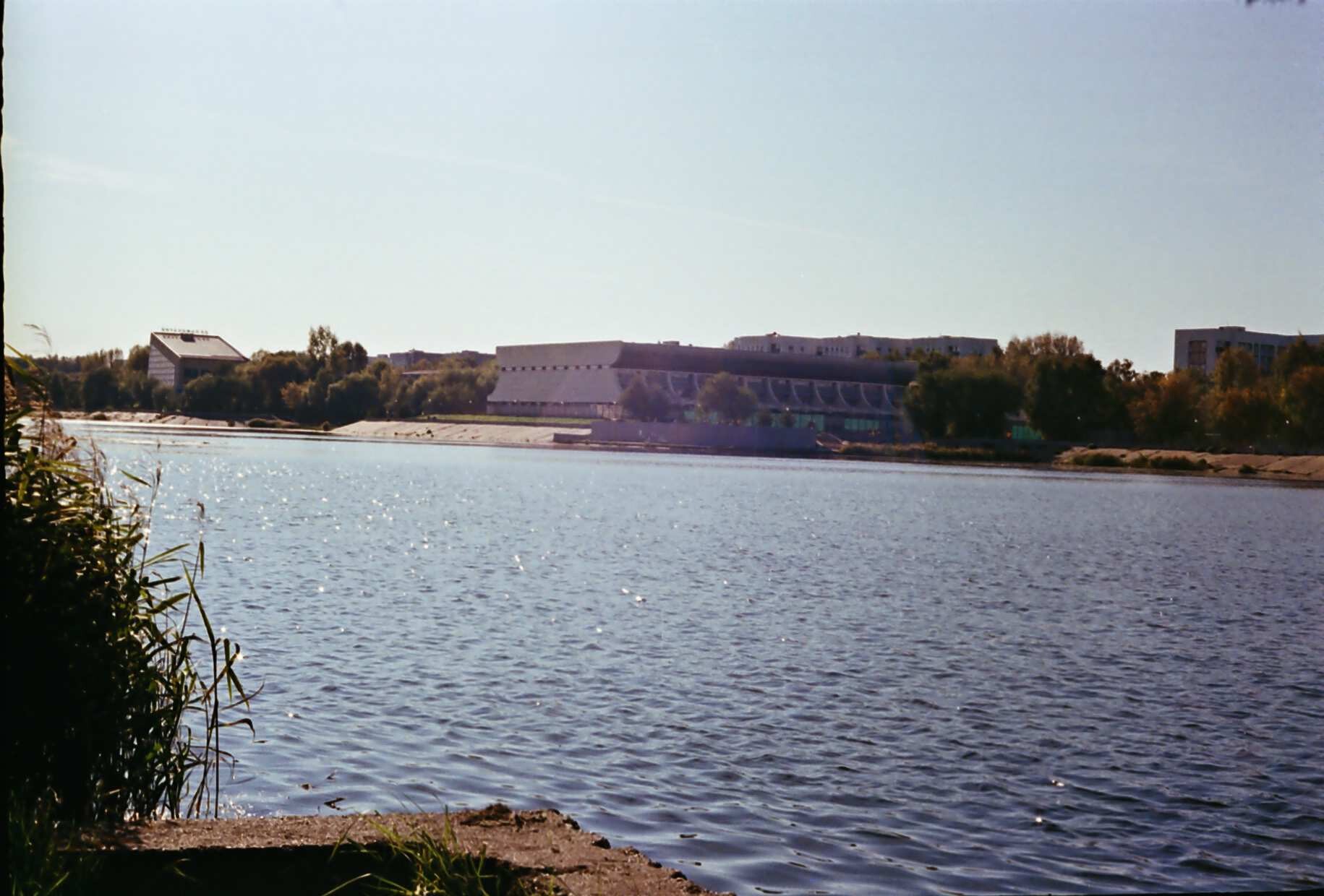 a smooth surface on the water in the sunlight
