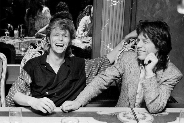 Мик Джаггер и Дэвид Боуи за ужином. 1987 год. Фотограф Дэнис О'Риган