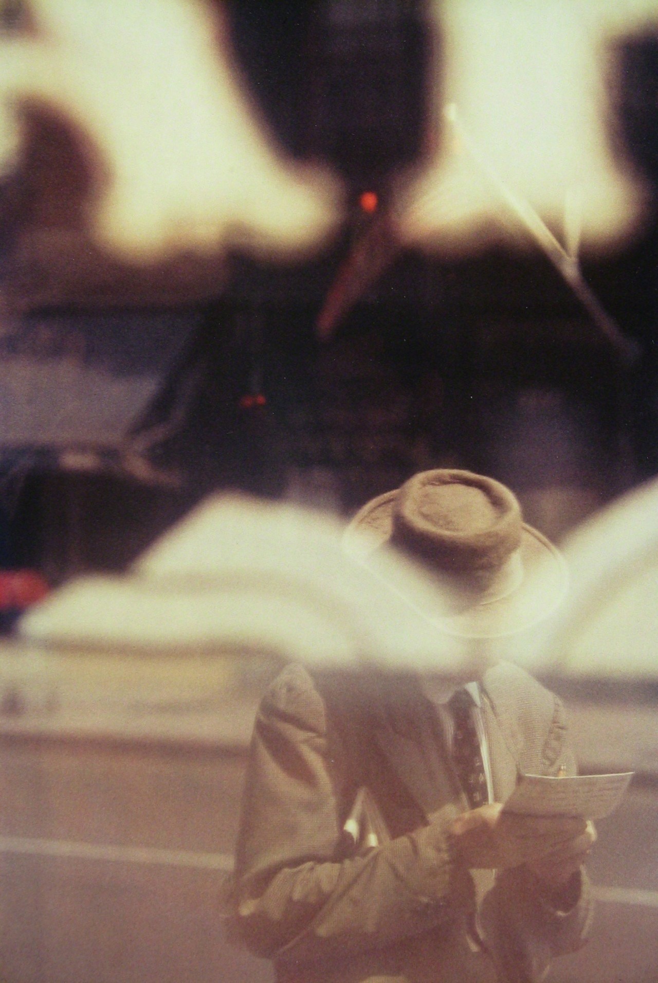 Человек читающий, 1957. Фотограф Сол Лейтер