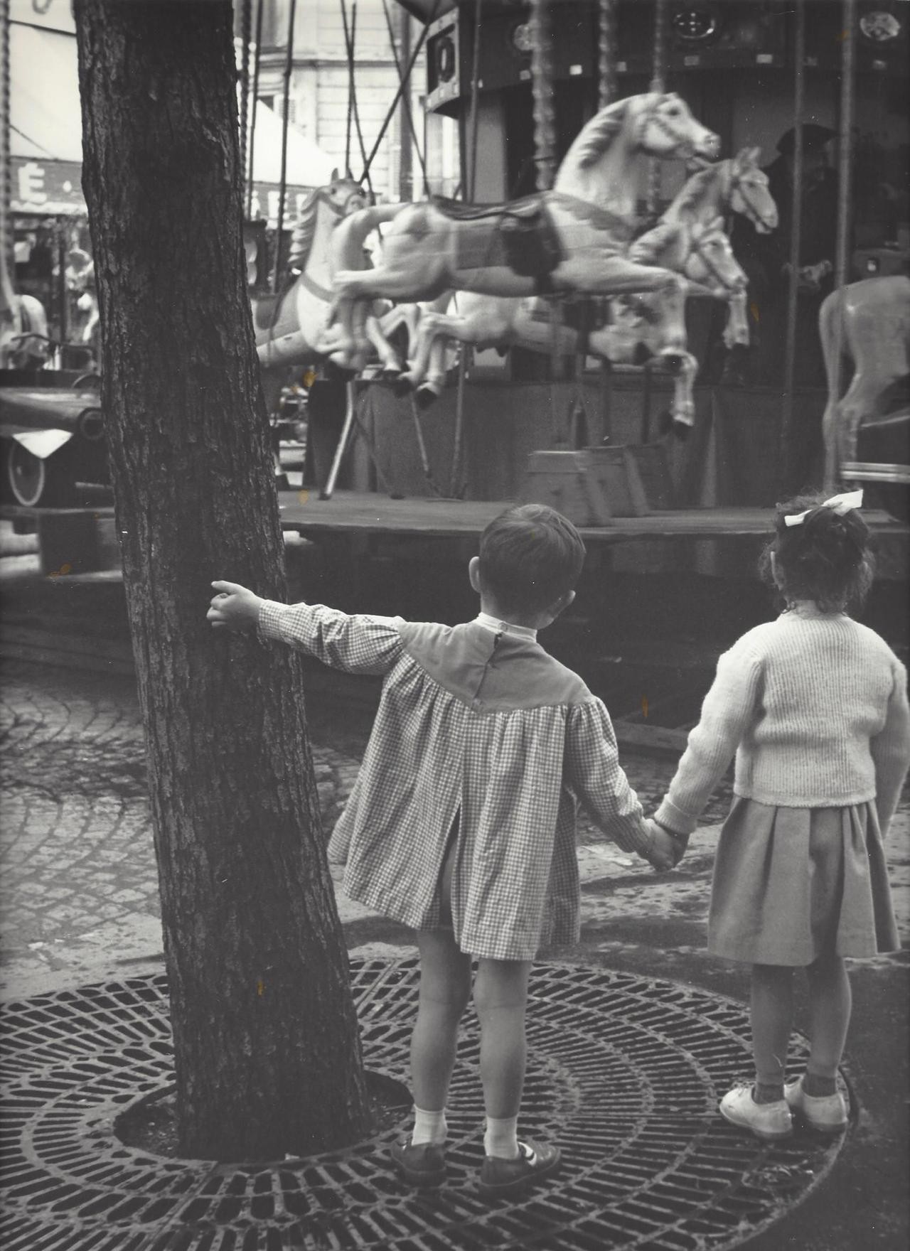 Карусель, Франция, 1950-е. Фотограф Кис Шерер
