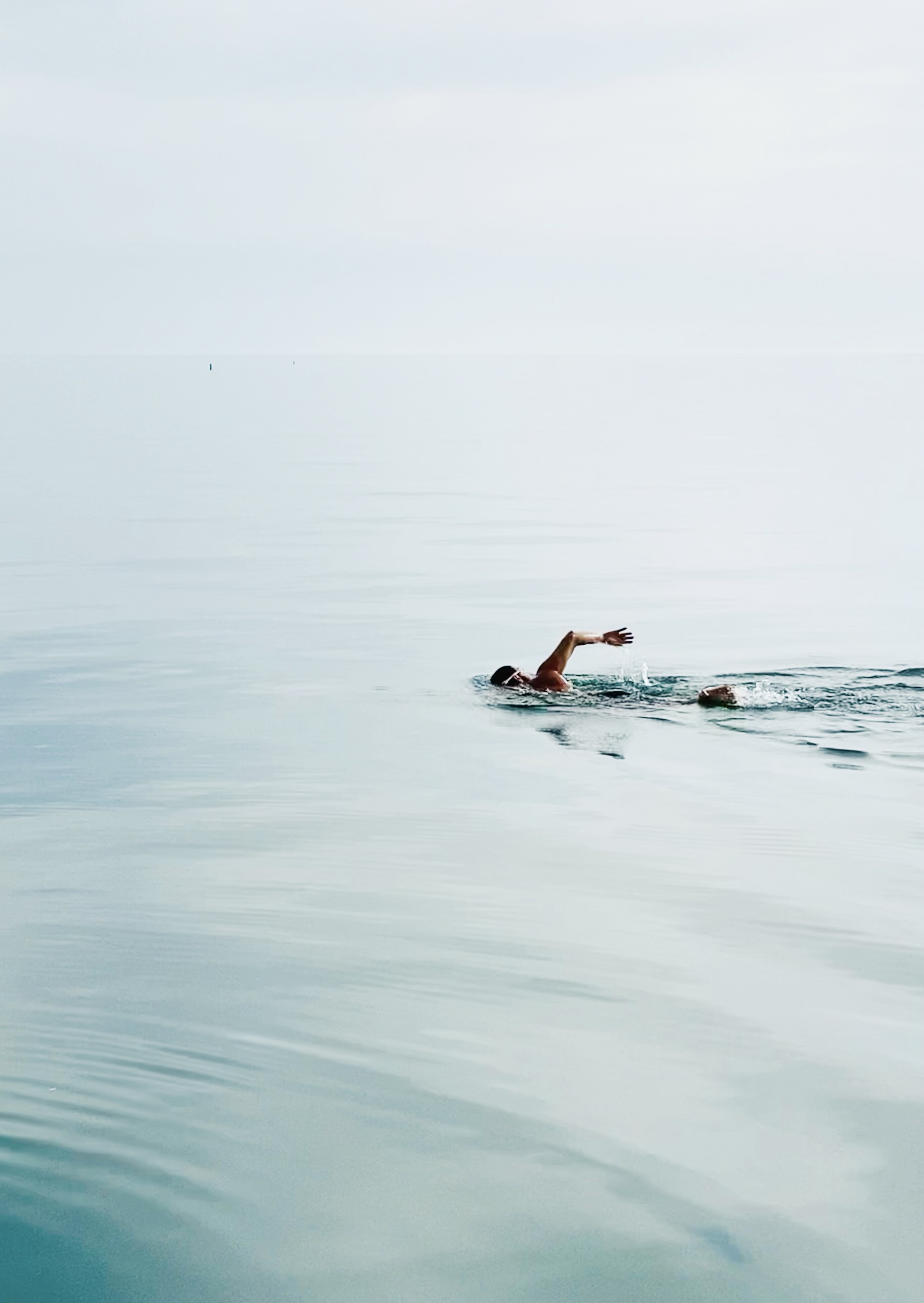 Финалист в категории Мобильная фотография, 2021. Пловец на озере Мичиган, Иллинойс, США. Автор Мег Винсент