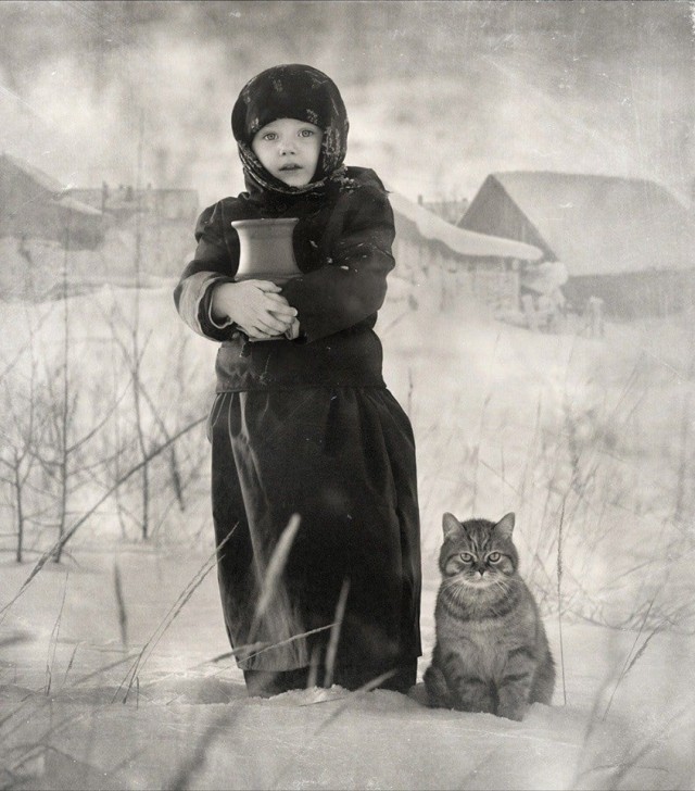 Девочка с котом. Фотограф Олег Ярунин