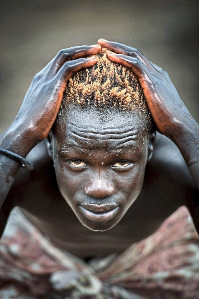 1-е место в категории «Люди и их истории», одиночное изображение, 2021. Портрет молодого пастуха в Южном Судане. Фотограф Тревор Коул