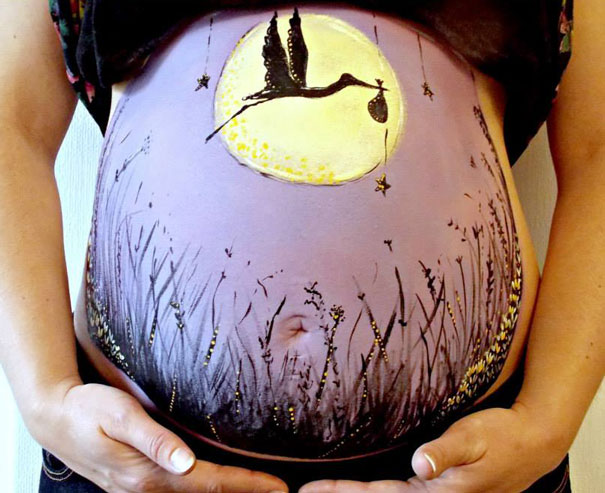 Сказочные рисунки на животах беременных женщин-10
