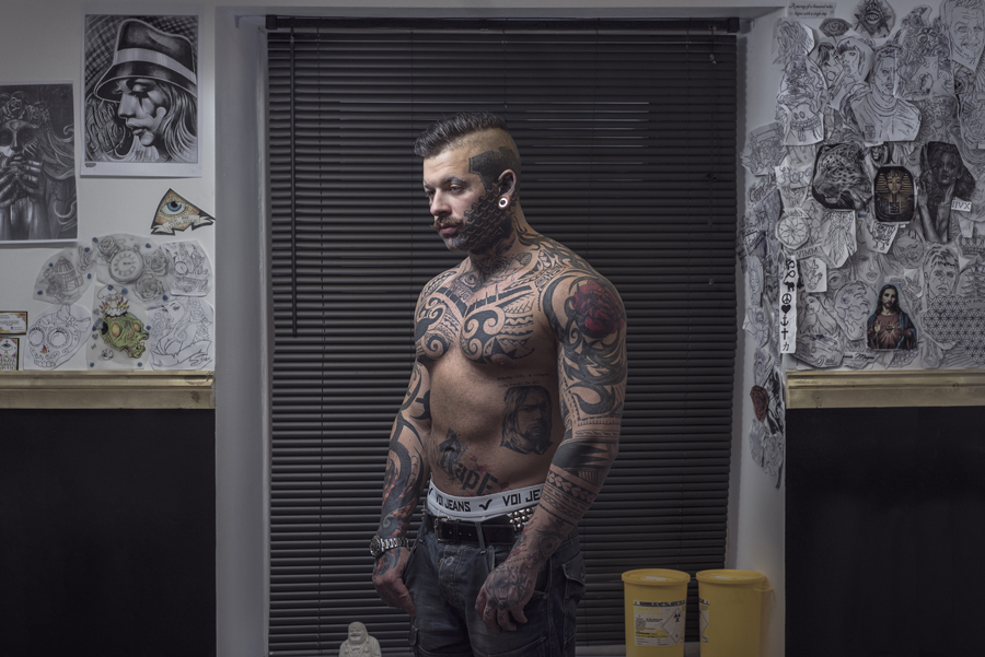 Портреты людей с татуировками на лицах