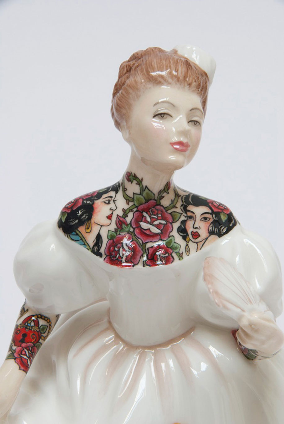 Artist Covers Her Graceful Porcelain Figures With Sailor Tattoos