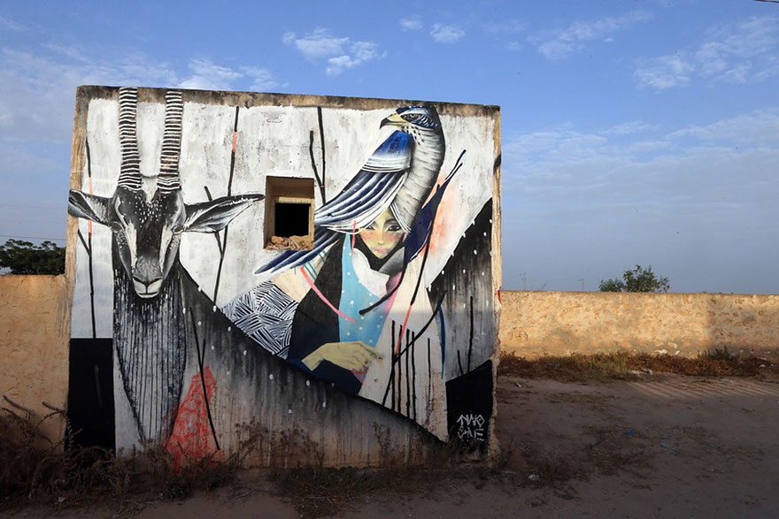 Массовый многонациональный стрит-арт в тунисской деревне от 150 уличных художников-14