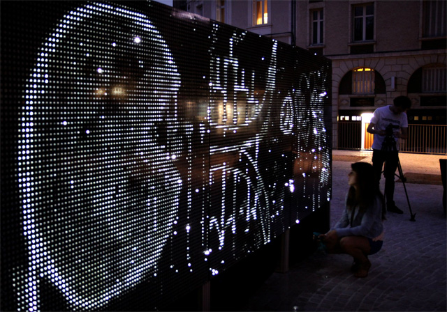 Water Light Graffiti: A Moisture-Sensitive Surface Embedded with LEDs Creates Illuminated Art