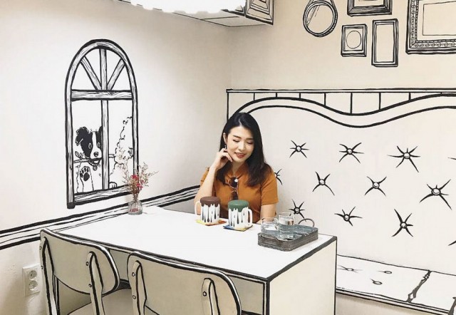 В Сеуле есть кафе, посетители которого словно попадают в нарисованную реальность