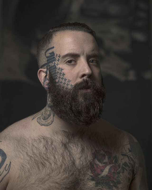 Портреты людей с татуировками на лицах