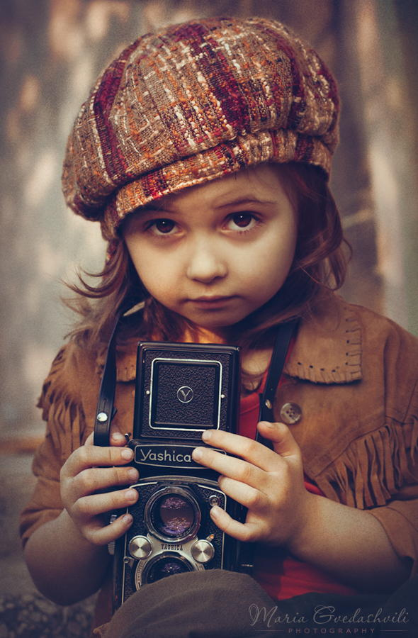 35 очаровательных юных фотографов