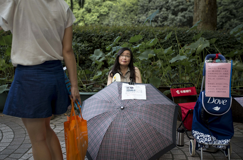 «Рынки любви». Как женщины ищут брачных партнёров в Китае 18